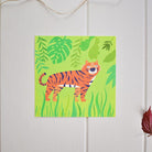 A greeting card of an adventurous tiger roaming through the jungle. Made in Ireland by Fleur & Mimi.