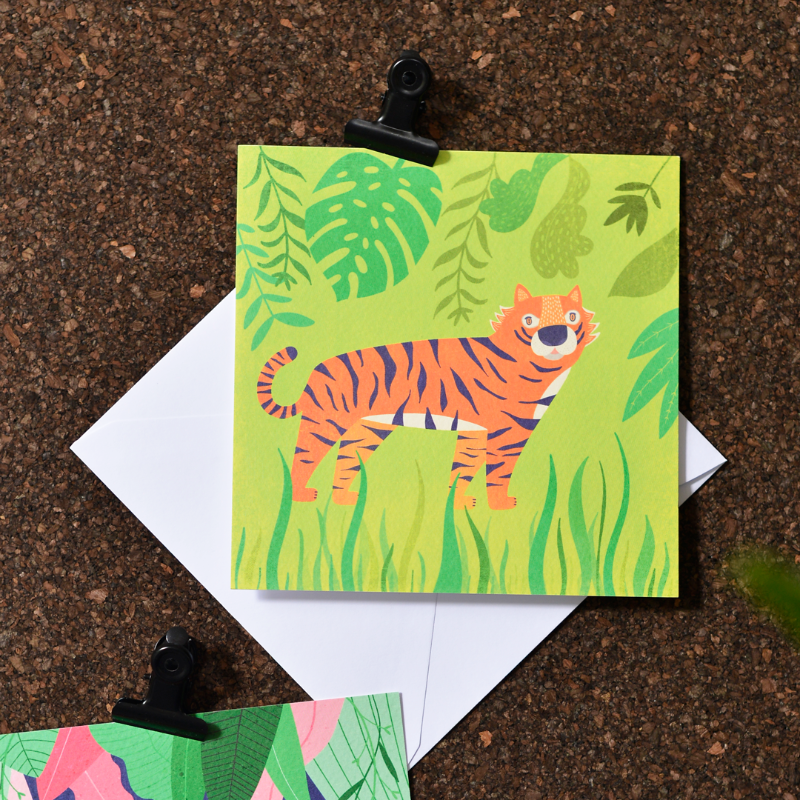 A greeting card of an adventurous tiger roaming through the jungle. Made in Ireland by Fleur & Mimi.